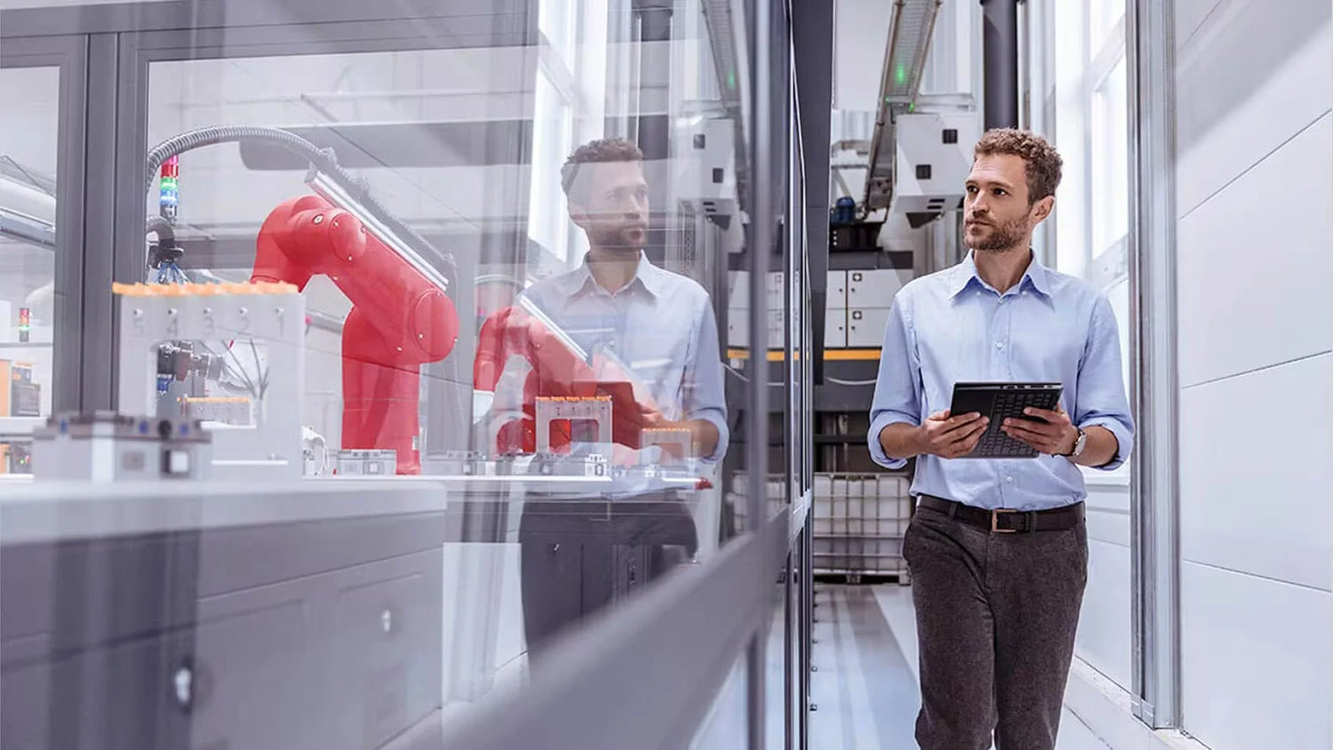 engineer inspecting refurbished Lenovo server inventory in automated high-tech facility to safeguard quality